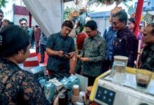 Bupati Wayan Adi Arnawa saat menghadiri dan menerima Sertifikat HKI di Kabupaten Klungkung